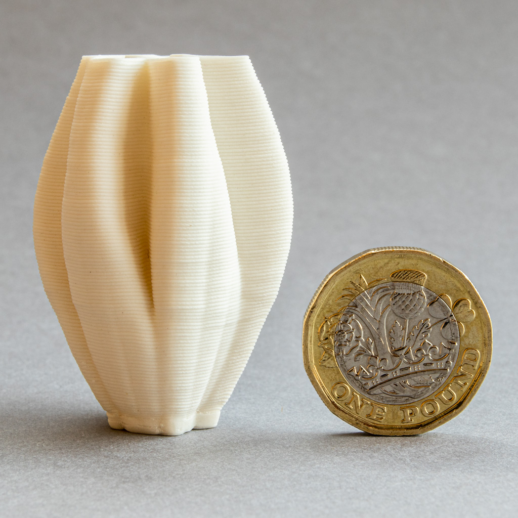 Tiny white porcelain tulip